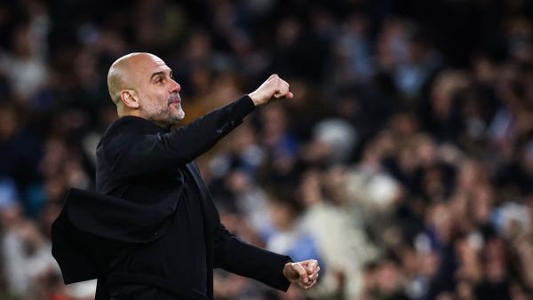 Manchester City's Spanish manager Pep Guardiola celebrates following his team first goal scored by Manchester City's Belgian midfielder #17 Kevin De Bruyne during the UEFA Champions League quarter-final second-leg football match between Manchester City and Real Madrid, at the Etihad Stadium, in Manchester, north-west England, on April 17, 2024. (Photo by Darren Staples / AFP) Manchester City's Spanish manager Pep Guardiola celebrates following his team first goal scored by Manchester City's Belgian midfielder #17 Kevin De Bruyne during the UEFA Champions League quarter-final second-leg football match between Manchester City and Real Madrid, at the Etihad Stadium, in Manchester, north-west England, on April 17, 2024. (Photo by Darren Staples / AFP)