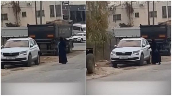 Female beggar in Ramallah