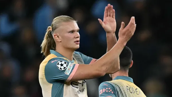 Manchester City's Norwegian striker #09 Erling Haaland applauds fans on the pitch after the UEFA Champions League, league phase football match between Manchester City and Inter Milan at the Etihad stadium, in Manchester, north-west England, on September 18, 2024 The game ended 0-0. (Photo by Paul ELLIS / AFP)
