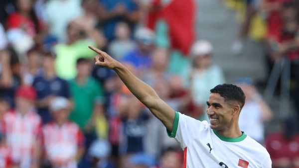 Morocco's defender #02 Achraf Hakimi celebrates scoring his team's sixth goal in the men's bronze medal football match between Egypt and Morocco during the Paris 2024 Olympic Games at the La Beaujoire Stadium in Nantes on August 8, 2024. (Photo by Alain JOCARD / AFP)