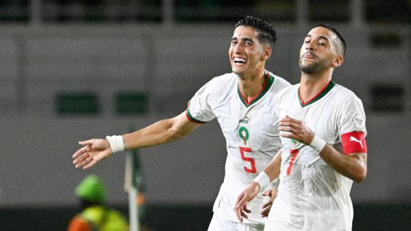 orocco's midfielder #7 Hakim Ziyech (R) celebrates with Morocco's defender #5 Nayef Aguerd after scoring his team's first goal during the Africa Cup of Nations (CAN) 2024 group F football match between Zambia and Morocco at the Stade Laurent Pokou in San Pedro on January 24, 2024. (Photo by SIA KAMBOU / AFP) orocco's midfielder #7 Hakim Ziyech (R) celebrates with Morocco's defender #5 Nayef Aguerd after scoring his team's first goal during the Africa Cup of Nations (CAN) 2024 group F football match between Zambia and Morocco at the Stade Laurent Pokou in San Pedro on January 24, 2024. (Photo by SIA KAMBOU / AFP)