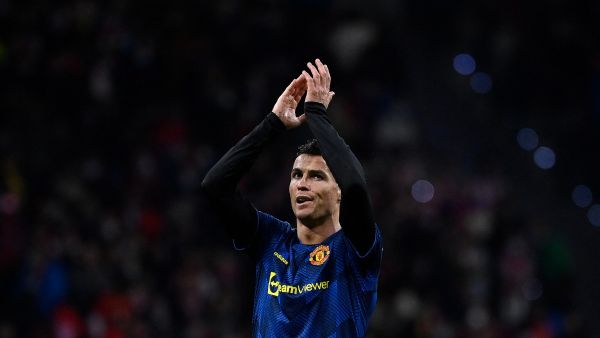 Manchester United's Portuguese forward Cristiano Ronaldo reacts at the end of the UEFA Champions League football match between Atletico de Madrid and Manchester United at the Wanda Metropolitano stadium in Madrid on February 23, 2022. (Photo by OSCAR DEL POZO / AFP)