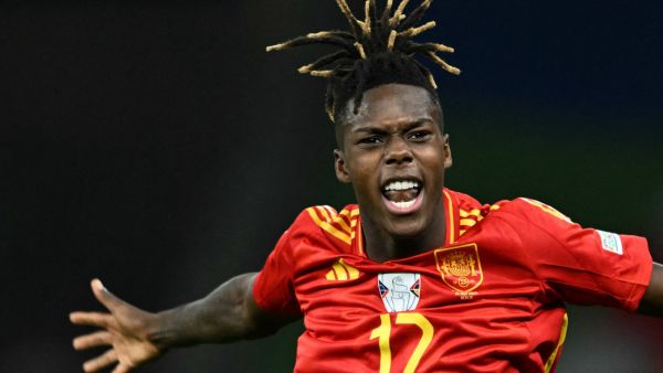 Spain's midfielder #17 Nico Williams celebrates scoring his team's first goal during the UEFA Euro 2024 final football match between Spain and England at the Olympiastadion in Berlin on July 14, 2024. (Photo by INA FASSBENDER / AFP)