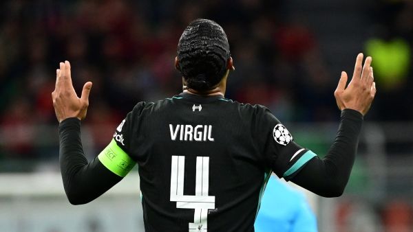 Liverpool's Dutch defender #04 Virgil van Dijk celebrates scoring his team's second goal during the UEFA Champions League 1st round day 1 football match between AC Milan and Liverpool FC at the San Siro stadium in Milan on September 17, 2024. (Photo by PIERO CRUCIATTI / AFP) Liverpool's Dutch defender #04 Virgil van Dijk celebrates scoring his team's second goal during the UEFA Champions League 1st round day 1 football match between AC Milan and Liverpool FC at the San Siro stadium in Milan on September 17, 2024. (Photo by PIERO CRUCIATTI / AFP)