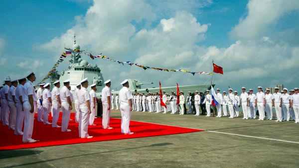 A grab taken from a handout footage released by the Russian Defence Ministry on July 15, 2024, shows Russian and Chinese sailors taking part in the opening ceremony of a joint maritime exercises at a port in Zhanjiang in China's southern Guangdong province. (Photo by Handout / Russian Defence Ministry / AFP)  India and China initiate troop withdrawal from contested border areas