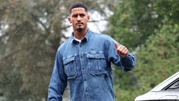 France's national football team's defender William Saliba gestures as he arrives to take part in the team's preparation for upcoming UEFA Nations League match qualifying matches in Clairefontaine-en-Yvelines on October 7, 2024. (Photo by FRANCK FIFE / AFP) France's national football team's defender William Saliba gestures as he arrives to take part in the team's preparation for upcoming UEFA Nations League match qualifying matches in Clairefontaine-en-Yvelines on October 7, 2024. (Photo by FRANCK FIFE / AFP)