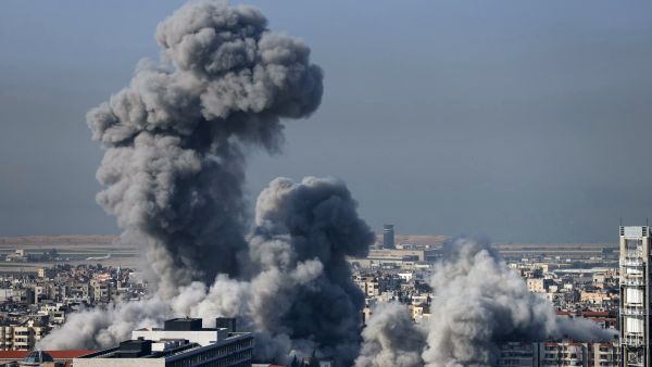 Heavy smoke rises during an Israeli airstrike in southern Beirut, in an area adjacent to the international airport, on November 23, 2024, amid the ongoing war between Israel and Hezbollah. (Photo by IBRAHIM AMRO / AFP) Israeli airstrikes in Beirut