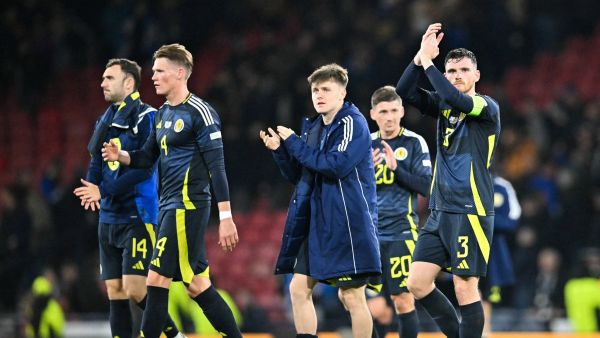 Scotland's defender #03 Andrew Robertson (R) applauds at the end of the UEFA Nations League, League A Group A1 football match between Scotland and Portugal at Hampden Park Stadium in Glasgow, on October 15, 2024. Scotland and Portugal equalised 0 - 0. (Photo by ANDY BUCHANAN / AFP)
