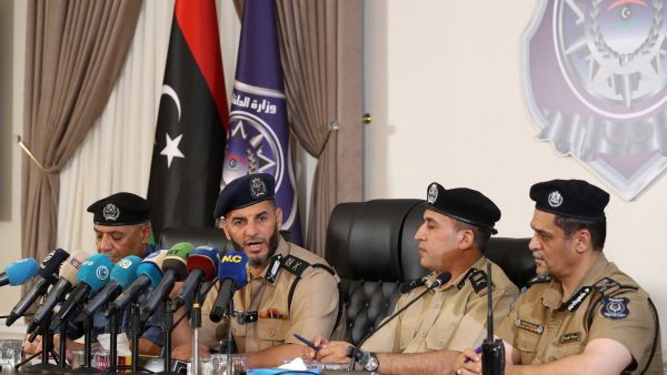Emad Trabelsi (2nd-L), Interior Minister in Libya's Government of National Unity (GNU), gives a press conference in Tripoli on August 23, 2024. (Photo by Mahmud Turkia / AFP) Libya