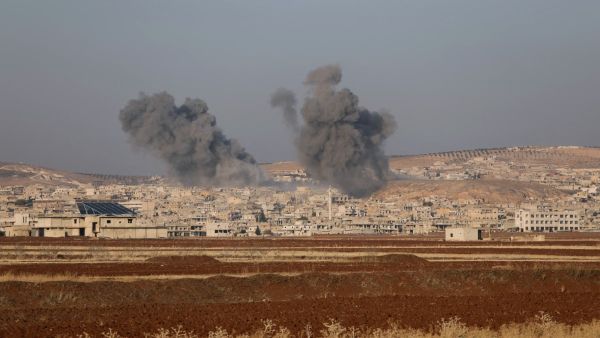 Smoke billows the the Syrian town of Suran, between Aleppo and Hama, on December 3, 2024.