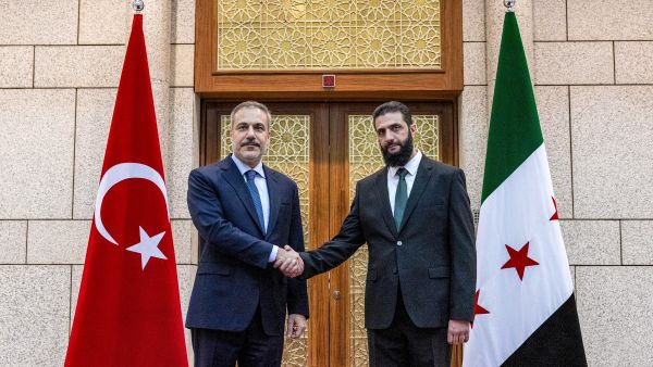 Hayat Tahrir al-Sham leader Ahmed al-Sharaa and Turkish FM Fidan