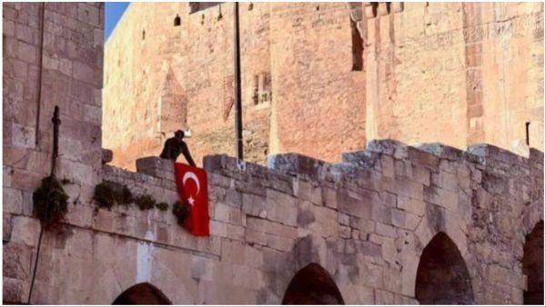 Photo allegedly showing Turkish flag over Aleppo castle. (X/ @EssraTurke) Turkish flag over Aleppo castle, esra erdogan