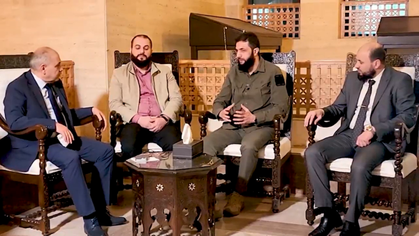 Syrian opposition and government leaders convene to coordinate power transition