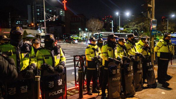 olice stand guard near the South Korean Presidential Office and the Defence Ministry in Seoul, early on December 3, 2024, after South Korean President Yoon Suk Yeol declared martial law. AFP South Korea plunges into unprecedented crisis as martial law sparks political turmoil
