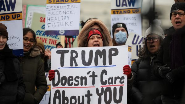 WASHINGTON, DC - FEBRUARY 19: Federal workers and supporters rally outside of the Department of Health and Human Services on February 19, 2025 in Washington, DC (Photo by Kayla Bartkowski / GETTY IMAGES NORTH AMERICA / Getty Images via AFP) Nationwide protests planned in US against Trump amid growing criticism from democrats