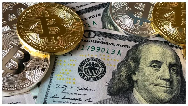 الضغوط المالية تدفع الدولار للتراجع وبتكوين تسجل رقماً قياسياً جديداً