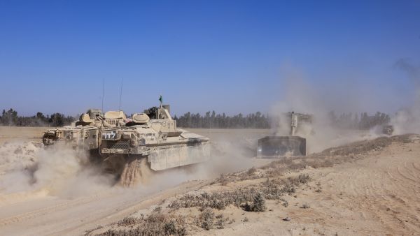 A picture taken near Israel's border with Gaza shows Israeli armoured vehicles and bulldozers returning from the besieged Palestinian territory on May 8, 2025, amid the ongoing war between Israel and Hamas. AFP Rafah ambush rocks Israeli forces as Gaza toll mounts; US proposes new aid plan