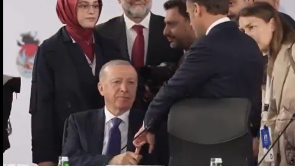 Erdogan grabs Macron’s finger in viral summit moment