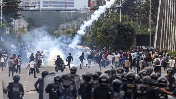 Riot police personnel fire tear gas to disperse demonstrators during a protest outside the Parliament in Kathmandu on September 8, 2025, condemning social media prohibitions and corruption by the government. (Photo by PRABIN RANABHAT / AFP) Nepal Gen Z protests