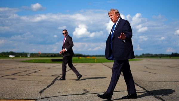 Trump getting off Air Force One