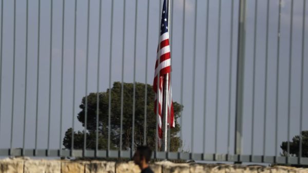 A picture taken on Feb. 24, 2018, shows the U.S. flag flying over the U.S. consulate building complex in Jerusalem, which is considered one of the options to host the new U.S. embassy headquarters after its relocation from Tel Aviv. The United States will move its embassy from Tel Aviv to Jerusalem in May 2018 to coincide with Israel's 70th Independence Day according to U.S. officials.
(AHMAD GHARABLI / AFP)