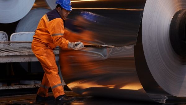 (FILES) In this file photo taken on Dec.12, 2014 an employee cuts into an aluminium roll at the Constellium factory in the eastern French city of Biesheim. Major steel and aluminium producing nations condemned on March 2, 2018 U.S. President Donald Trump's plan to impose tariffs on the industry, as stock markets plunged on fears of an imminent tit-for-tat trade war.
(Patrick HERTZOG / AFP)
