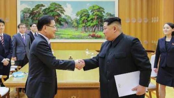 North Korean leader Kim Jong Un shaking hands with South Korean chief delegator Chung Eui-yong (AFP/File Photo)