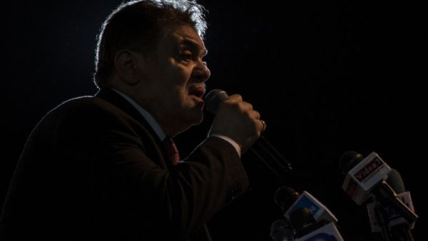 El-Sayed El-Badawi, head of Egypt's Al-Wafd Party, speaks during a rally for supporters of President Abdel Fattah al-Sisi in a neighbourhood in Cairo on Mar. 9, 2018. 
(IBRAHIM EZZAT / AFP)