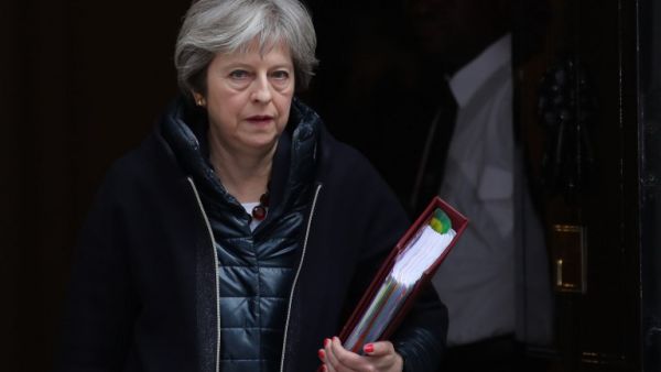 Britain's Prime Minister Theresa May leaves 10 Downing street for the weekly Prime Minister Question (PMQ) session in the House of Commons in London on Mar.14, 2018. 
(Daniel LEAL-OLIVAS / AFP)