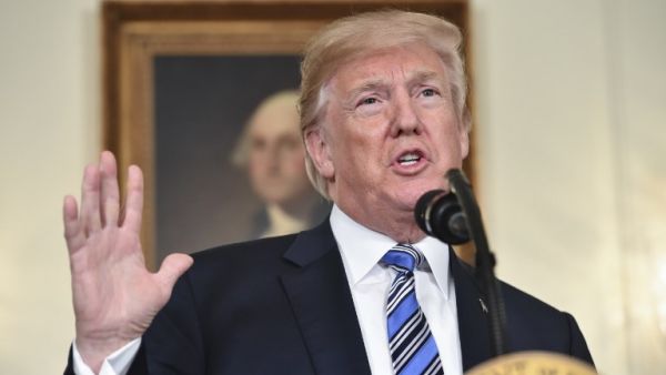 U.S. President Donald Trump speaks about the spending bill during a press conference in the Diplomatic Reception Room at the White House on Mar. 23, 2018. (Nicholas Kamm / AFP)