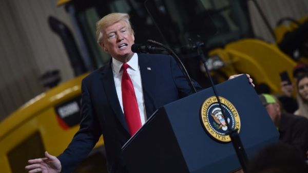 U.S. President Donald Trump speaks on infrastructure development at the Richfield Training Site, south of Cleveland, Ohio on Mar. 29, 2018. Trump is visiting Ohio to speak on infrastructure development before heading to Palm Beach, Florida. 
(Nicholas Kamm / AFP)