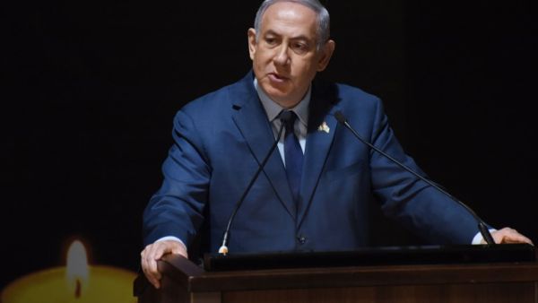 Israeli Prime Minister Benjamin Netanyahu speaks at the official ceremony for Israel's Remembrance Day for fallen soldiers in the Mt. Herzl Military Cemetery in Jerusalem on Apr. 18, 2018. Israel mark the Remembrance to commemorate over 23,646 fallen soldiers since 1860, just before the celebrations of the 70th anniversary of its creation according to the Jewish calendar.
(DEBBIE HILL / POOL / AFP)