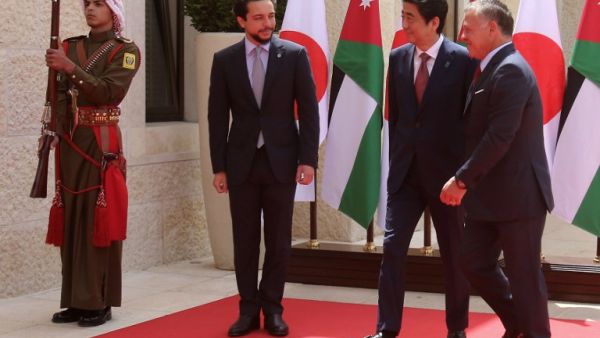 Japanese Prime Minister Shinzo Abe (C), Jordan's King Abdullah II, Crown Prince Hussein (L)/ AFP