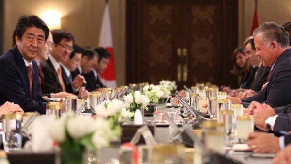 Japan's Prime Minister Shinzo Abe attends a meeting with the Jordanian King Abdullah II (AFP/File Photo)	