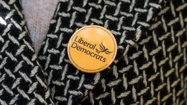 A Liberal Democrats pin badge worn by Mary D'Albert, a Liberal Democrats councillor (AFP/File Photo)