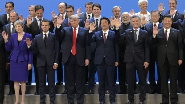 Participants of the G20 Leaders' Summit in Buenos Aires, pose for a family photo on November 30, 2018. Global leaders gather in the Argentine capital for a two-day G20 summit likely to be dominated by simmering international tensions over trade.
JUAN MABROMATA / AFP Participants of the G20 Leaders' Summit in Buenos Aires, pose for a family photo on November 30, 2018. Global leaders gather in the Argentine capital for a two-day G20 summit likely to be dominated by simmering international tensions over trade.
JUAN MABROMATA / AFP