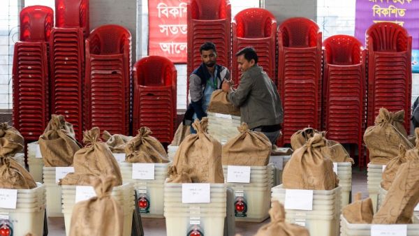 Bangladeshi electoral officials carry polling materials at distributing center in Dhaka on December 29, 2018. (AFP/File)