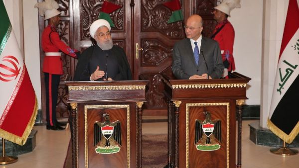 Iranian President Hassan Rouhani (L) speaks during a joint press conference with his Iraqi counterpart Barham Saleh at the Presidential palace in Baghdad on March 11, 2019. (AFP/ File)
