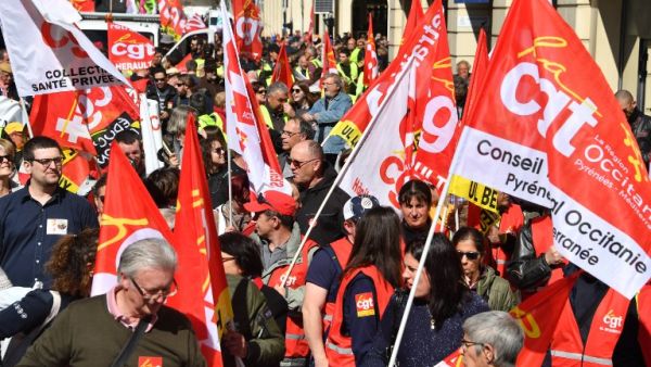Demonstrators including 'Yellow Vest' (gilets jaunes) protesters take part in a 'Day of strikes' called by French workers' unions. ()