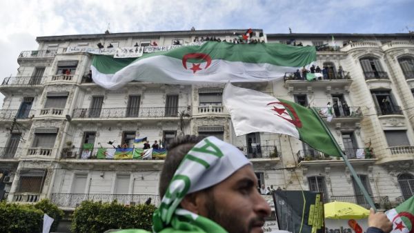 Algerians take part in a demonstration against ailing President Abdelaziz Bouteflika in the capital Algiers on March 22, 2019. (AFP/ RYAD KRAMDI)