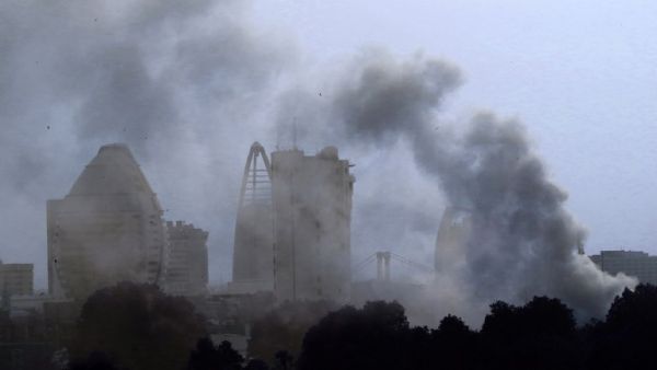 plumes of smoke billow into the sky more than an hour after a fire ripped through Sudan's old presidential palace in the capital Khartoum, on March 23, 2019. (AFP/File)