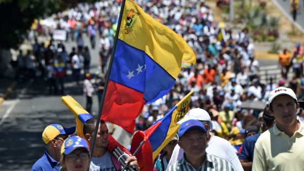 Supporters of Venezuelan opposition leader and self-proclaimed interim president Juan Guaido take part in a demo in Caracas on April 6, 2019.  (AFP/ File Photo)