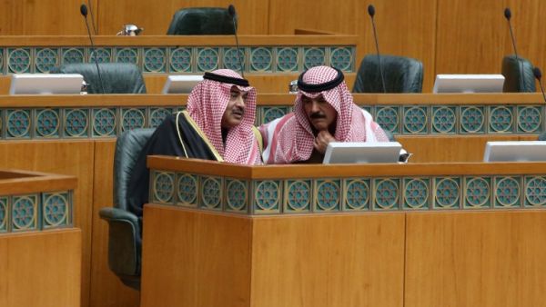 Kuwaiti MPs, Interior Minister Sheikh Mohammad al-Khaled al-Sabah (R) and Foreign Minister Sabah al-Khaled al-Sabah take part in a parliament session at Kuwait's National Assembly on January 13, 2016. (AFP/Yasser al-Zayyat)
