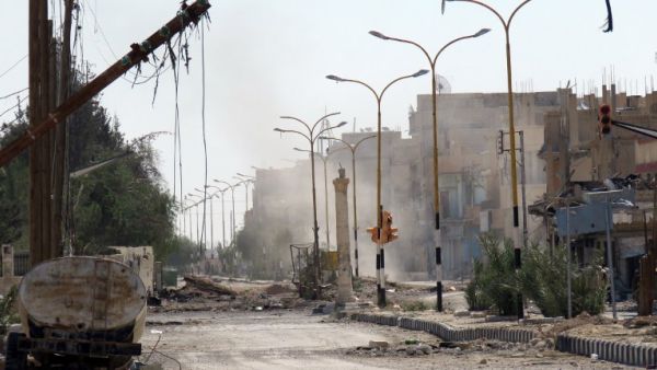 Destruction is seen in the historical city of Palmyra in central Syria on March 29, 2016. (AFP/STR)