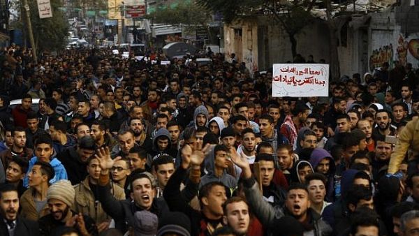 Palestinian say they wont stop their marches even after the killing of 18 Palestinians by the Israel army (AFP/ File Photo)