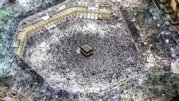 An aerial view shows Muslim pilgrims circumambulating the Kaaba, Islam's holiest shrine, at the Grand Mosque in Saudi Arabia's holy city of Mecca on September 3, 2017, during the annual Hajj pilgrimage. 
(BANDAR ALDANDANI / AFP)