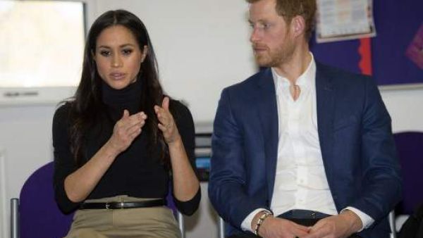 Prince Harry and his fiancee Meghan Markle  (AFP/File Photo)	