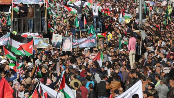 Protesters shout slogans and wave Palestinian flags during a demonstration against the U.S. president's decision to recognize Jerusalem as the capital of Israel, on Dec. 8, 2017, in the Jordanian capital Amman (Khalil Mazraawi/AFP)