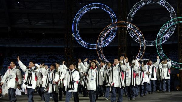 This file photo taken on February 10, 2006 shows South Korean and North Korean athletes marching together during the opening ceremony of the 2006 Winter Olympics at the Olympic stadium in Turin (ERIC FEFERBERG / AFP)