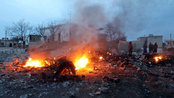 A picture taken on Feb. 3, 2018, shows smoke billowing from the site of a downed Sukhoi-25 fighter jet in Syria's northwest province of Idlib (OMAR HAJ KADOUR / AFP)